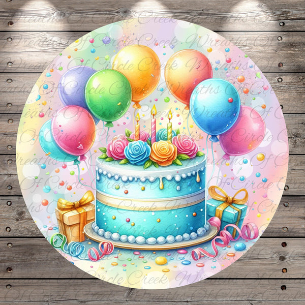 A colorful birthday cake surrounded by balloons, presents, and confetti, with a "Happy Birthday" sign on top.