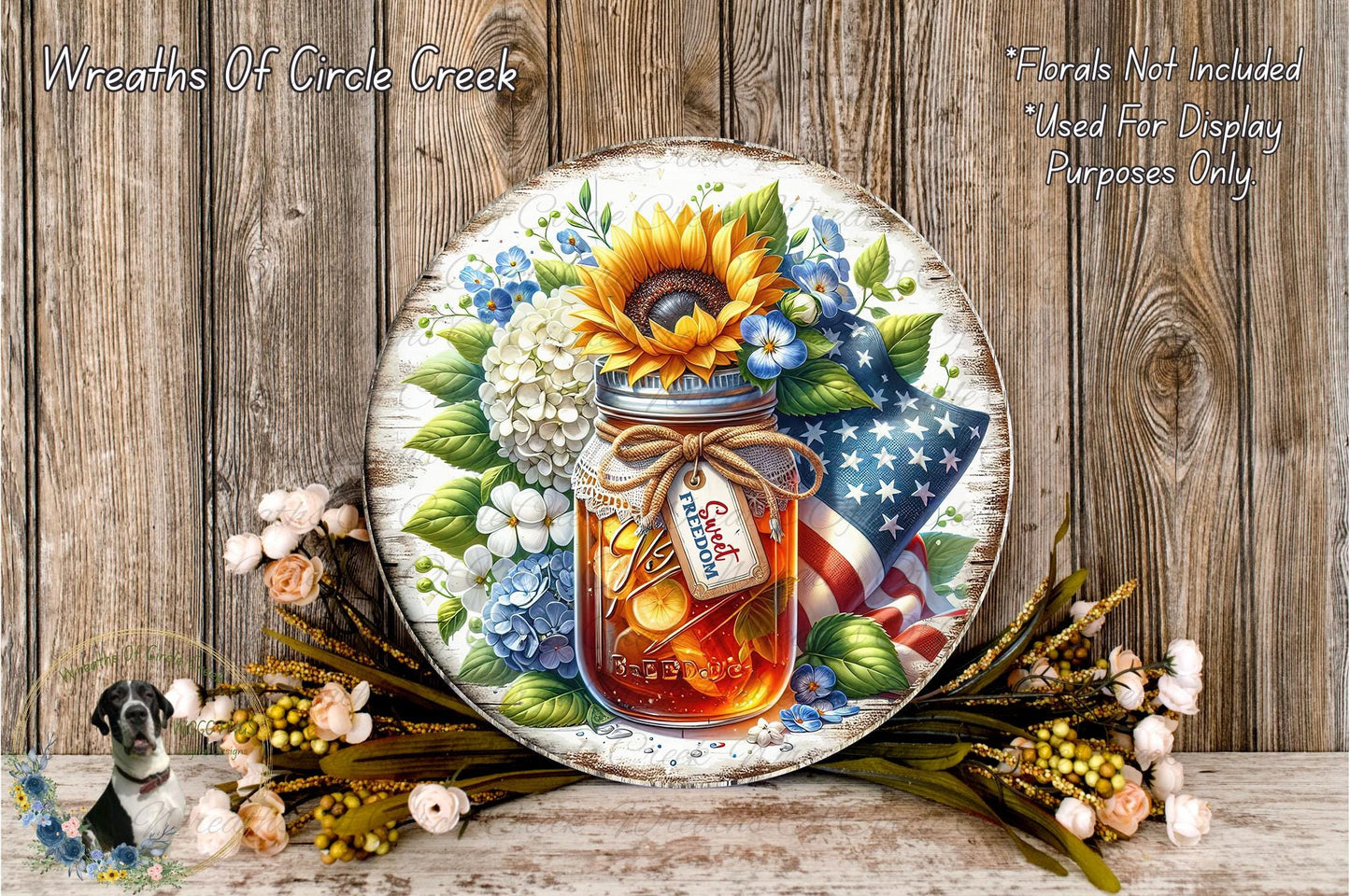 A round wooden plaque with a painted jar of honey surrounded by flowers, including a sunflower, hydrangeas, and an American flag.