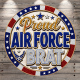 a circular graphic with the text "Proud Air Force Brat" surrounded by stars and stripes, which appears to be a patriotic design or decoration.