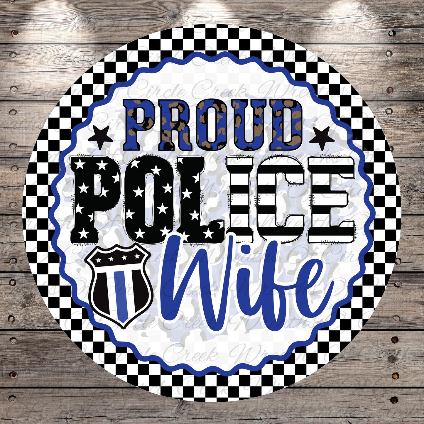 a circular design with a checkered border and a police officer's badge symbol. The text "Proud Police Wife" is prominently displayed in the center of the design.