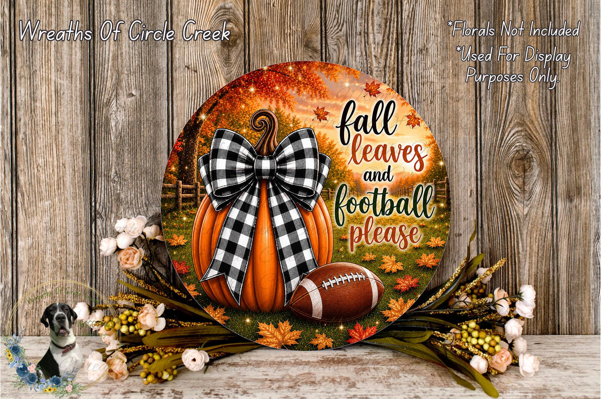 a decorative plate with a pumpkin, football, and fall leaves, surrounded by flowers and a bow. The plate has a message that reads "fall leaves and football please".