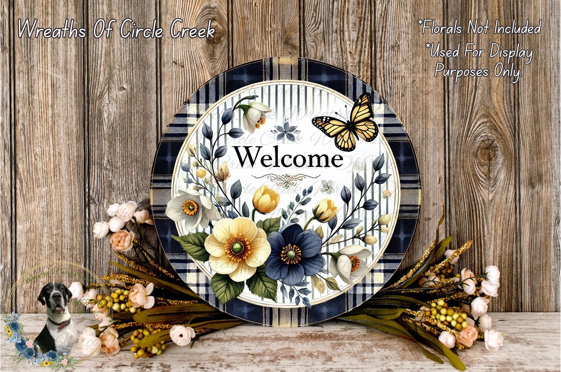 a decorative plate with a floral design, surrounded by a bouquet of flowers and a butterfly, set against a wooden background.