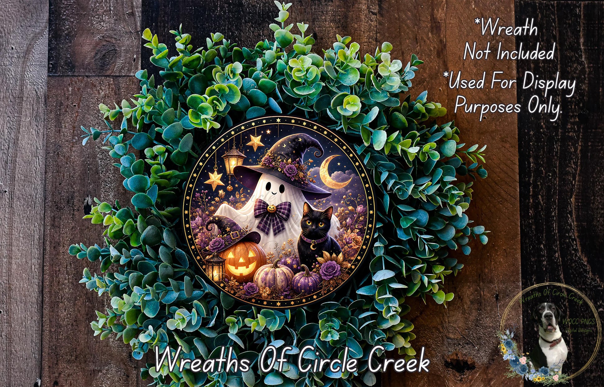 A Halloween-themed wreath featuring a ghost, a witch, a cat, and pumpkins, with a pumpkin lantern and a black cat. The wreath is surrounded by greenery and has a text overlay that reads "Wreath Not Included * Used For Display Purposes Only".