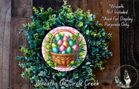a wreath made of green leaves and a basket filled with colorful Easter eggs, set against a wooden background.