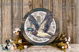 a wooden frame with a detailed illustration of a duck in flight, surrounded by a floral arrangement and a wooden background.