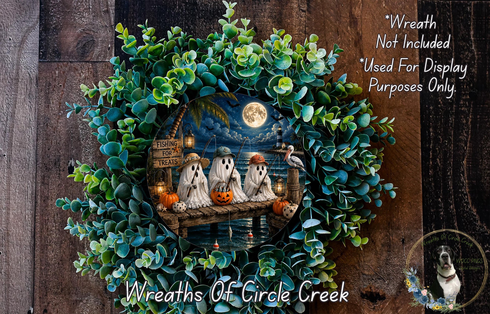 A Halloween-themed wreath with three ghostly figures sitting on a dock, surrounded by greenery and a full moon. The wreath is displayed on a wooden wall, and there is a small dog in the bottom right corner.