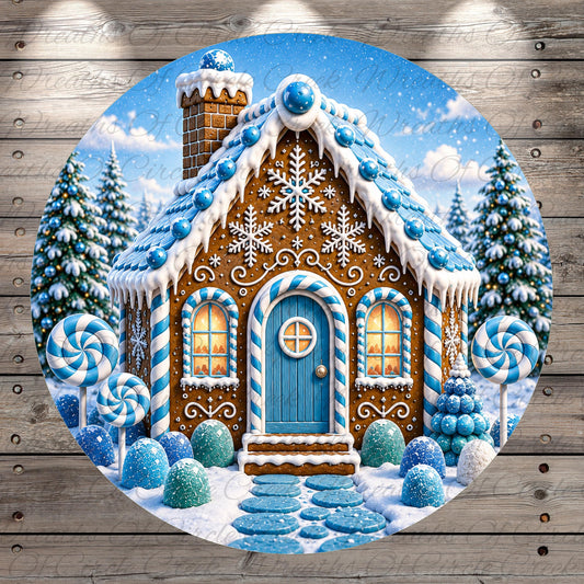 A beautifully decorated gingerbread house with blue and white snowflakes, surrounded by candy canes and other festive decorations, set against a snowy winter landscape with pine trees.