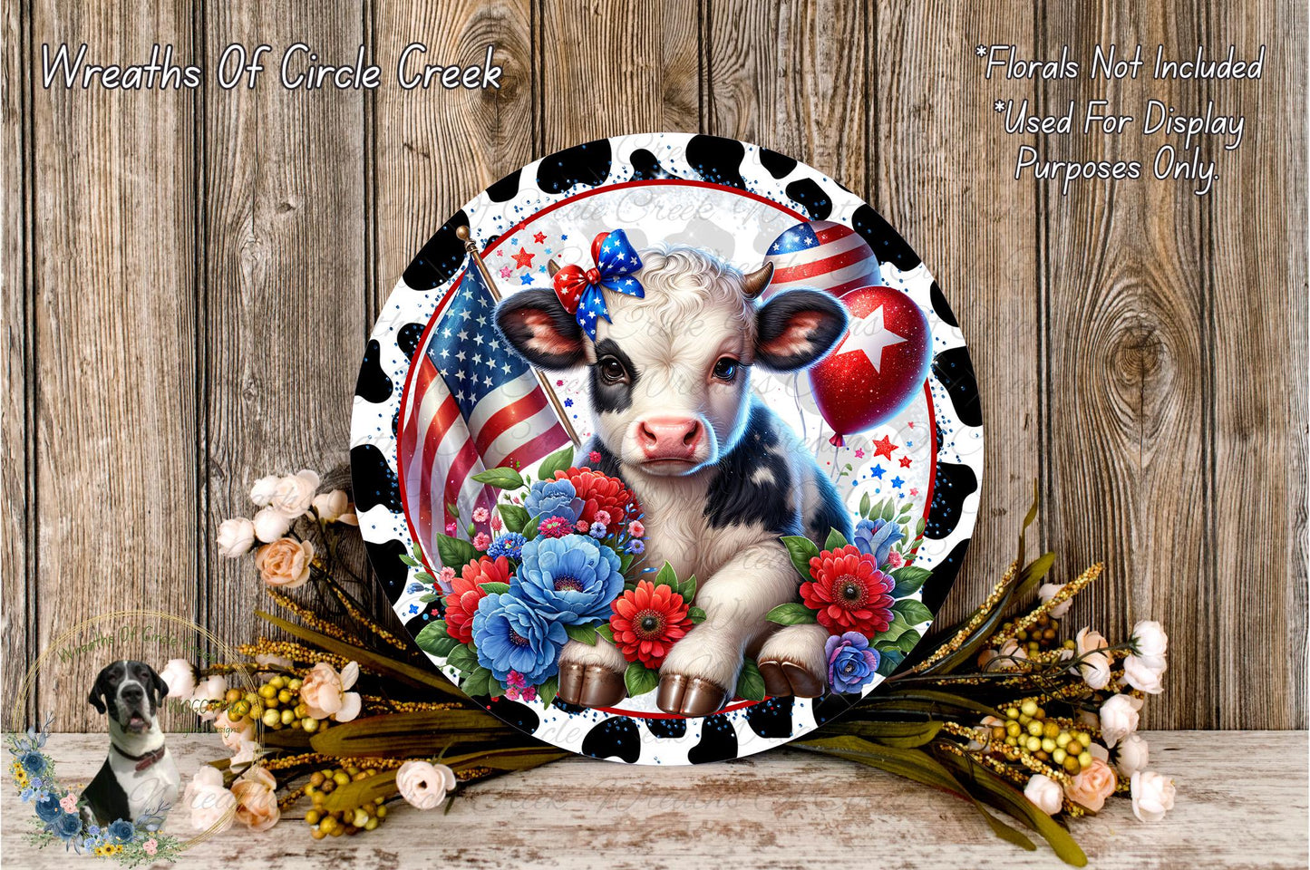A decorative plate featuring a cow surrounded by flowers and American flags, with the text "Wreaths Of Circle Creek" and "Flowers Not Included Used For Display Purposes Only" displayed.