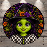A whimsical illustration of a green-skinned, purple-haired girl wearing a witch's hat adorned with flowers, set against a background of purple and orange flowers and leaves.