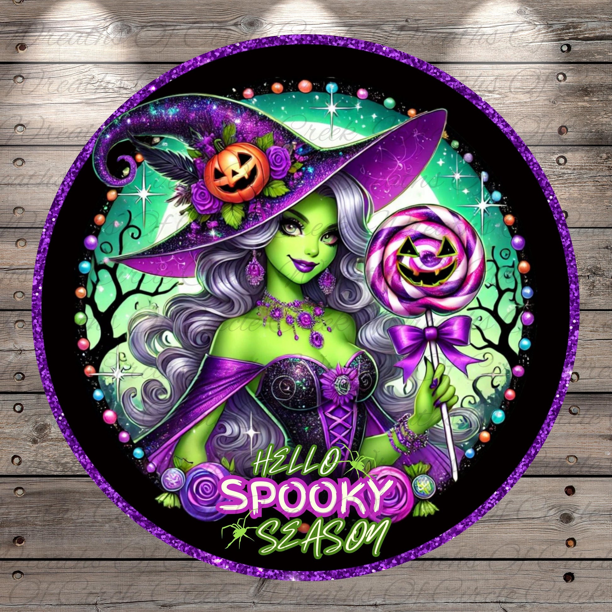A colorful illustration of a woman with purple hair and a purple witch hat, holding a lollipop and surrounded by Halloween-themed elements such as pumpkins, bats, and stars.
