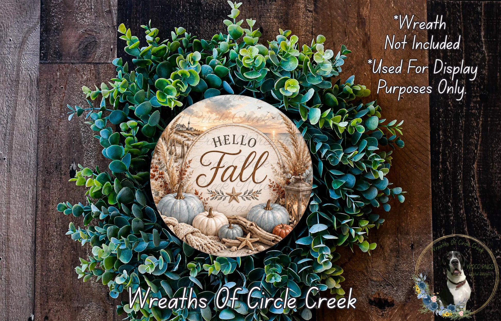 a wreath made of various fall-themed elements, including pumpkins, leaves, and greenery, with a circular sign that says "Hello Fall" in the center.