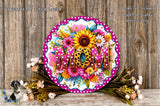 A decorative wreath with the word "MOM" prominently displayed in the center, surrounded by a variety of colorful flowers and foliage.
