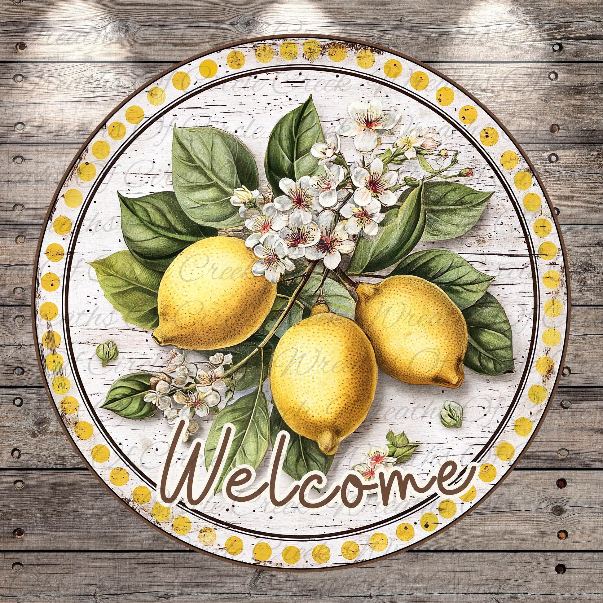 A circular welcome sign featuring a vibrant illustration of lemons, flowers, and leaves.