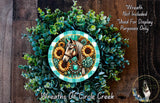 a wreath with a horse and sunflowers, surrounded by greenery. The wreath is placed on a wooden surface.