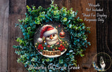 A wreath with a Santa hat and a "Welcome" sign, surrounded by greenery, is displayed on a wooden surface.