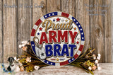 a patriotic-themed wreath with the text "Proud Army Brat" displayed prominently. The wreath is surrounded by flowers, and the background is a wooden wall.