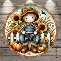 A cheerful scarecrow figure holding a "Welcome to our Patch" sign, surrounded by a rustic autumnal scene with sunflowers, pumpkins, and a wooden fence.