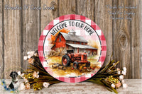 a red barn and a red tractor, surrounded by a floral arrangement and a wooden wall.