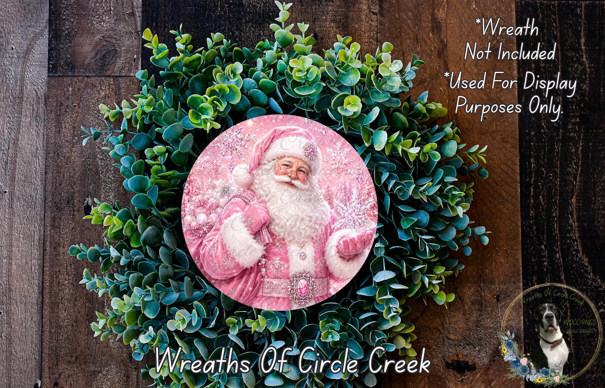 A wreath featuring a Santa Claus image surrounded by greenery, with a text overlay that reads "Wreath Not Included * Used For Display Purposes Only" and "Wreaths of Circle Creek".