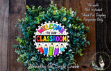 a wreath made of green leaves and colorful pencils, with the text "Welcome to our classroom" displayed on it.