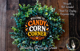 a wreath made of green leaves and orange and white candy corn, with the text "Welcome to Candy Corn Corner" prominently displayed in the center.