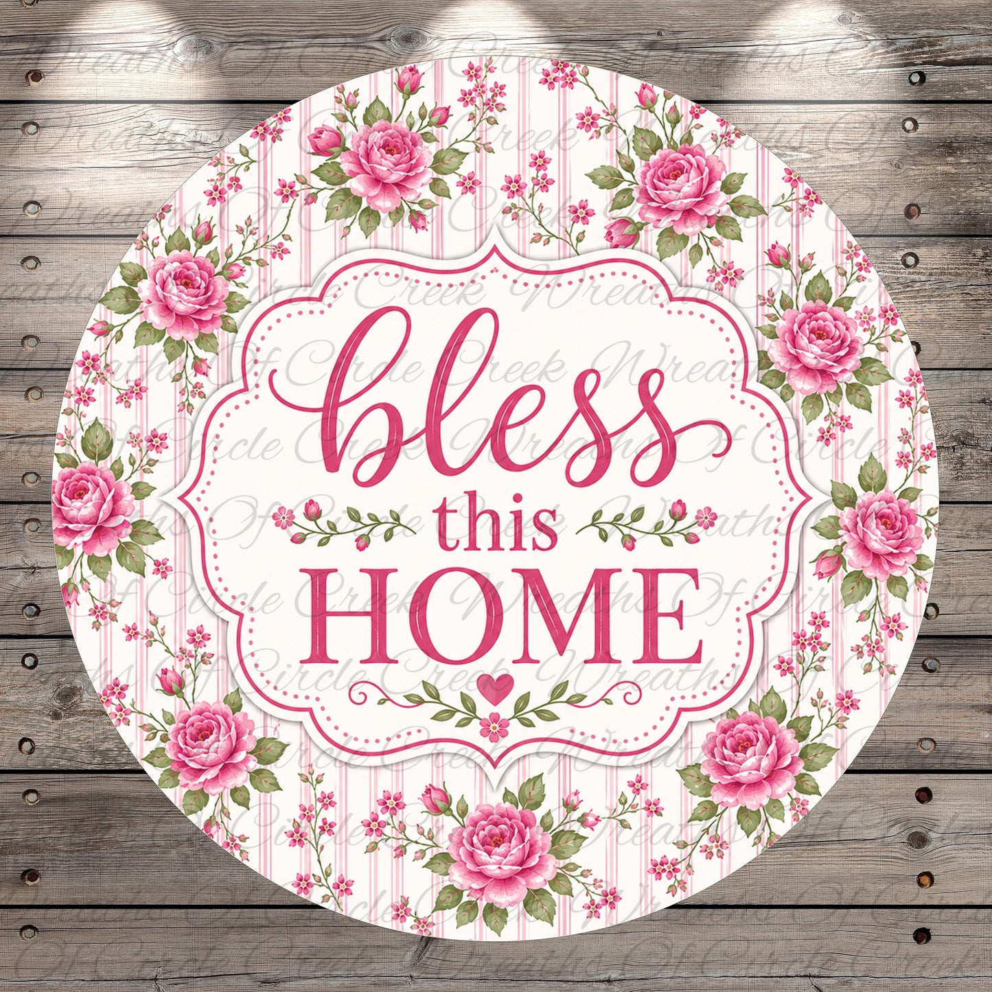 A round sign with a floral border and the text "bless this home" in pink and white.