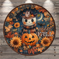 A Halloween-themed wreath with a skeleton wearing a cowboy hat, surrounded by autumn leaves, sunflowers, and a jack-o-lantern. The text "Hello Fall" is displayed on the wreath.