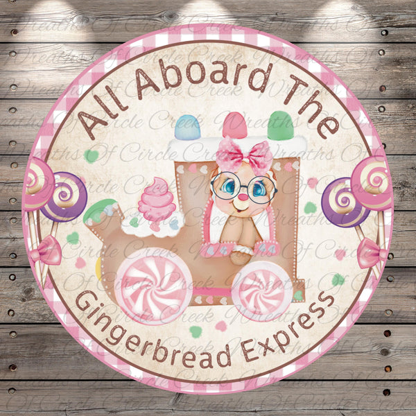 a pink and white sign that says, all aboard the gingerbread express