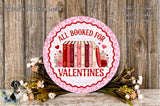a round sign with the text "All Booked For Valentine's Day" surrounded by a floral arrangement and a wooden background.