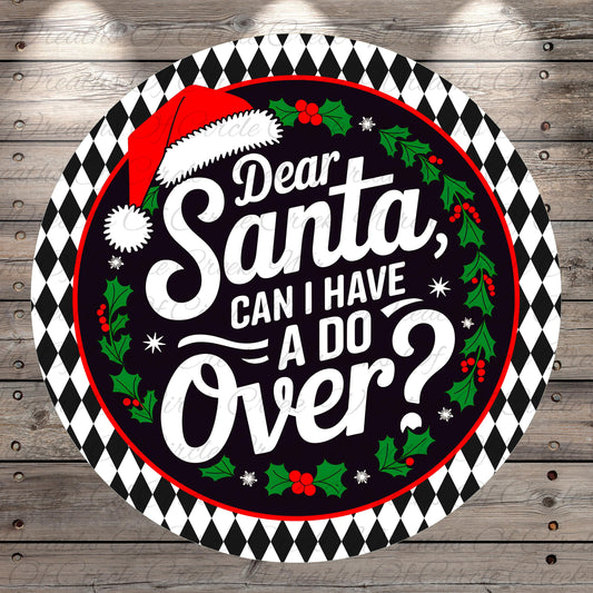a circular design with a Santa hat and holiday decorations, surrounded by text that reads "Dear Santa, can I have a do over?".