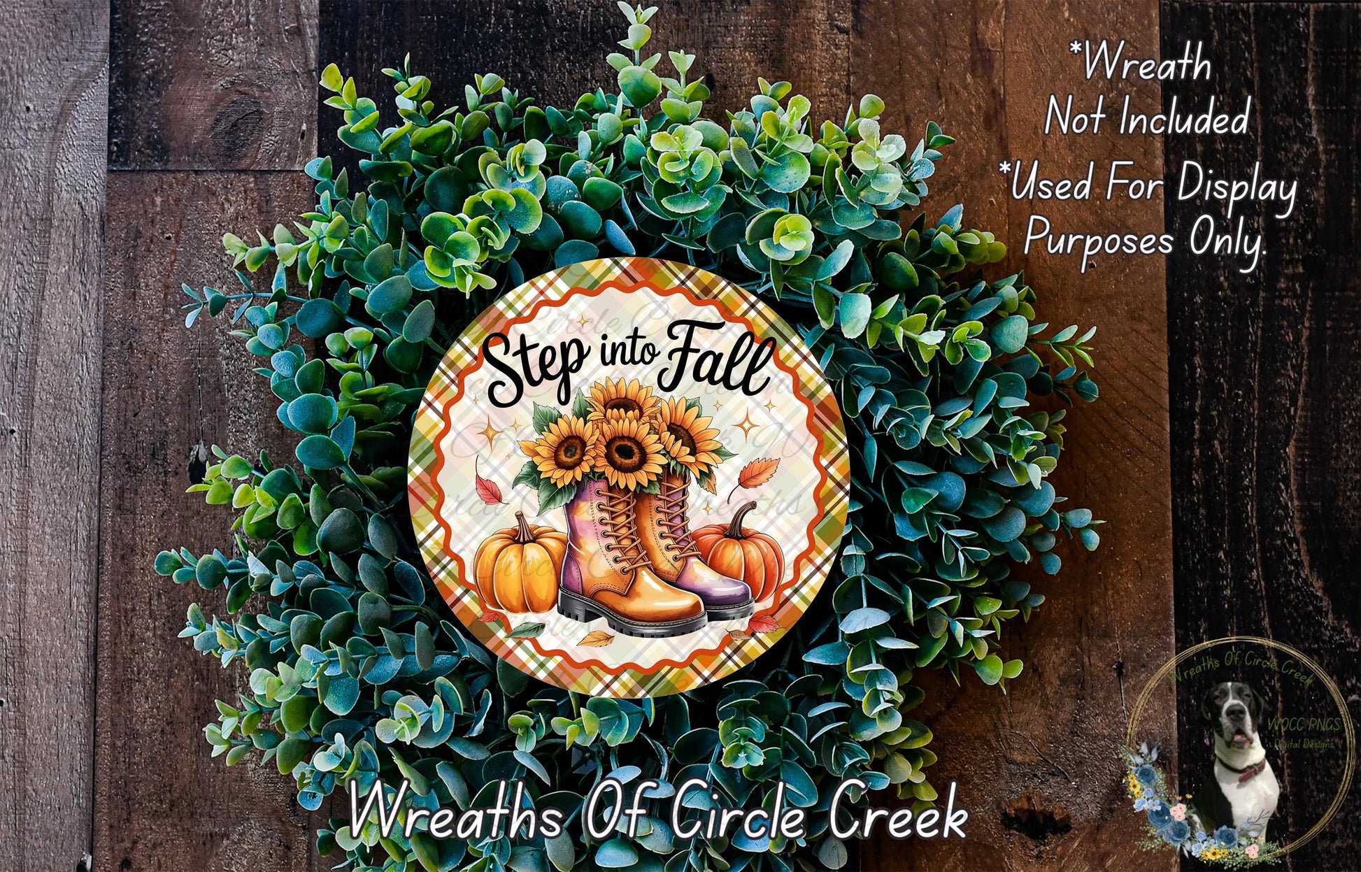 a wreath made of various fall-themed elements, including sunflowers, pumpkins, and boots. The wreath is displayed on a wooden surface, and there is a sign that reads "Step into Fall" and "Wreath Not Included * Used For Display Purposes Only".
