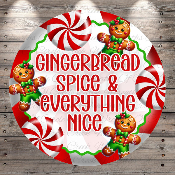 A circular design featuring a gingerbread man surrounded by red and white striped candy canes, with the text "Gingerbread Spice & Everything Nice" prominently displayed.