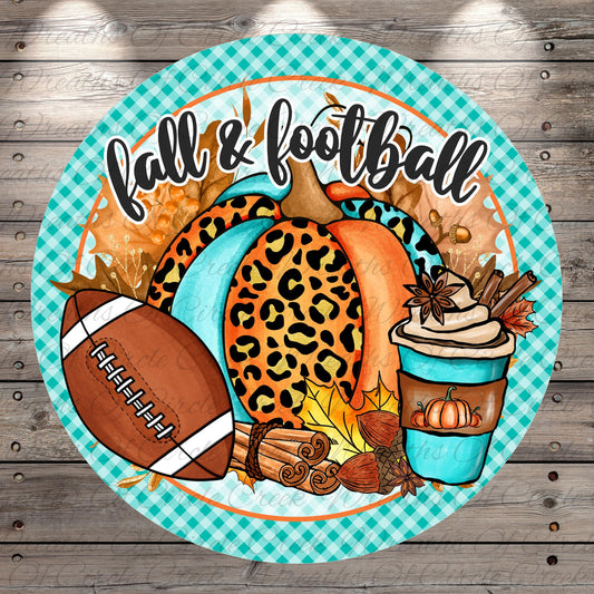 A round decorative plate with a football, leopard print pumpkin, coffee cup, and autumn leaves, along with the text "fall & football" written on it.