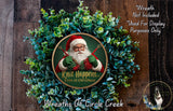 a Christmas wreath with a Santa Claus figure in the center, surrounded by a lush green wreath. The wreath is displayed on a wooden background, and there is a text overlay that reads "Knit Happens... Even at Christmas" and "Wreaths of Circle Creek".