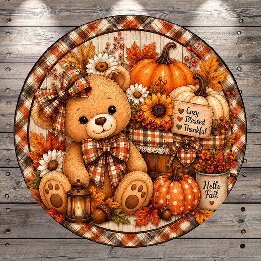A teddy bear wearing a plaid bow sits amidst a festive autumn scene, surrounded by pumpkins, flowers, and a lantern.