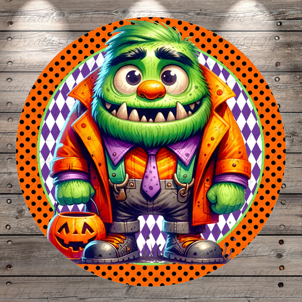 A cartoon monster with a green body, orange jacket, and purple pants is holding a carved pumpkin, standing against a wooden background with a polka dot border.