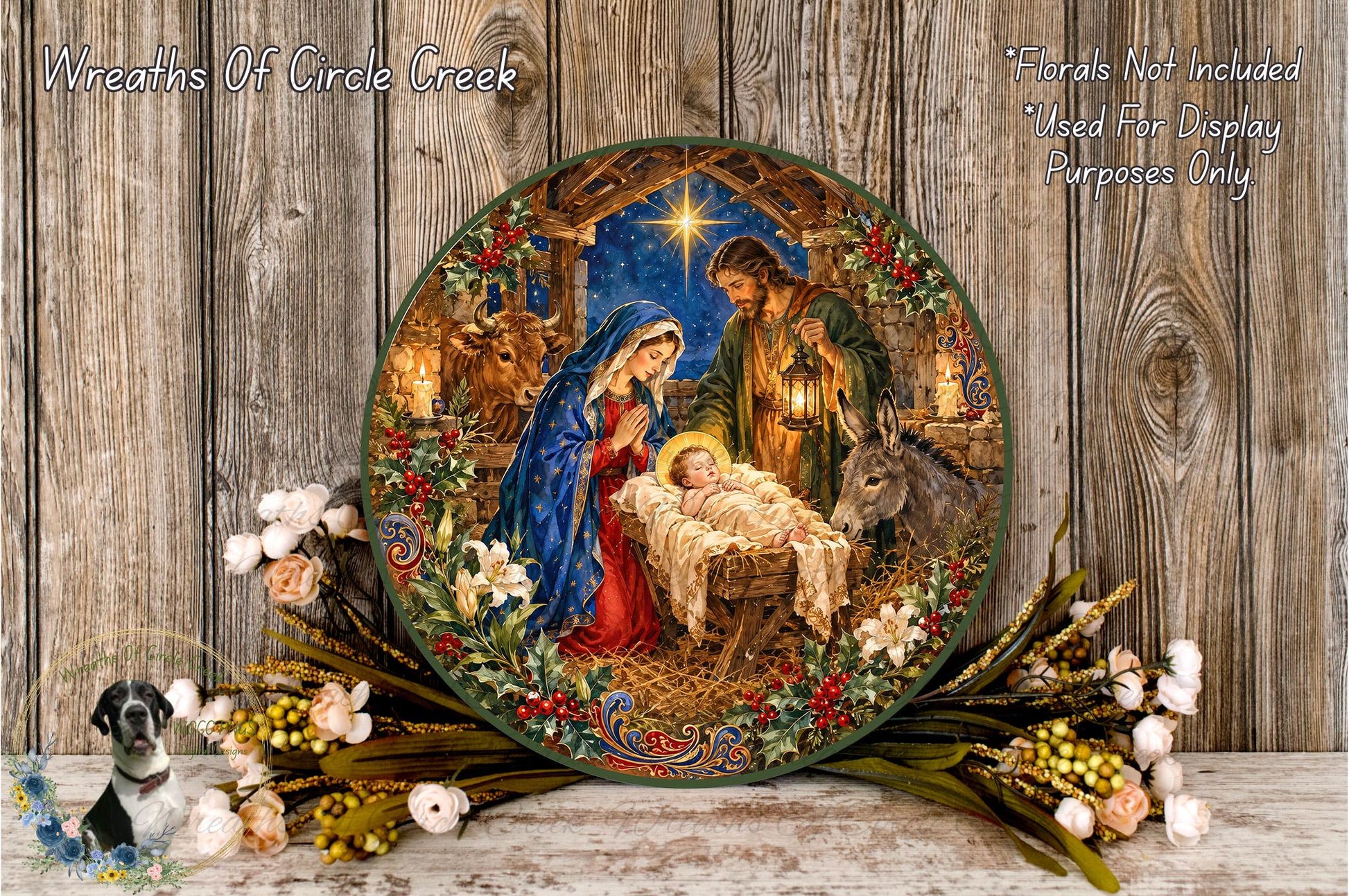 A decorative plate featuring a nativity scene with the baby Jesus, Mary, and Joseph, surrounded by flowers and greenery.