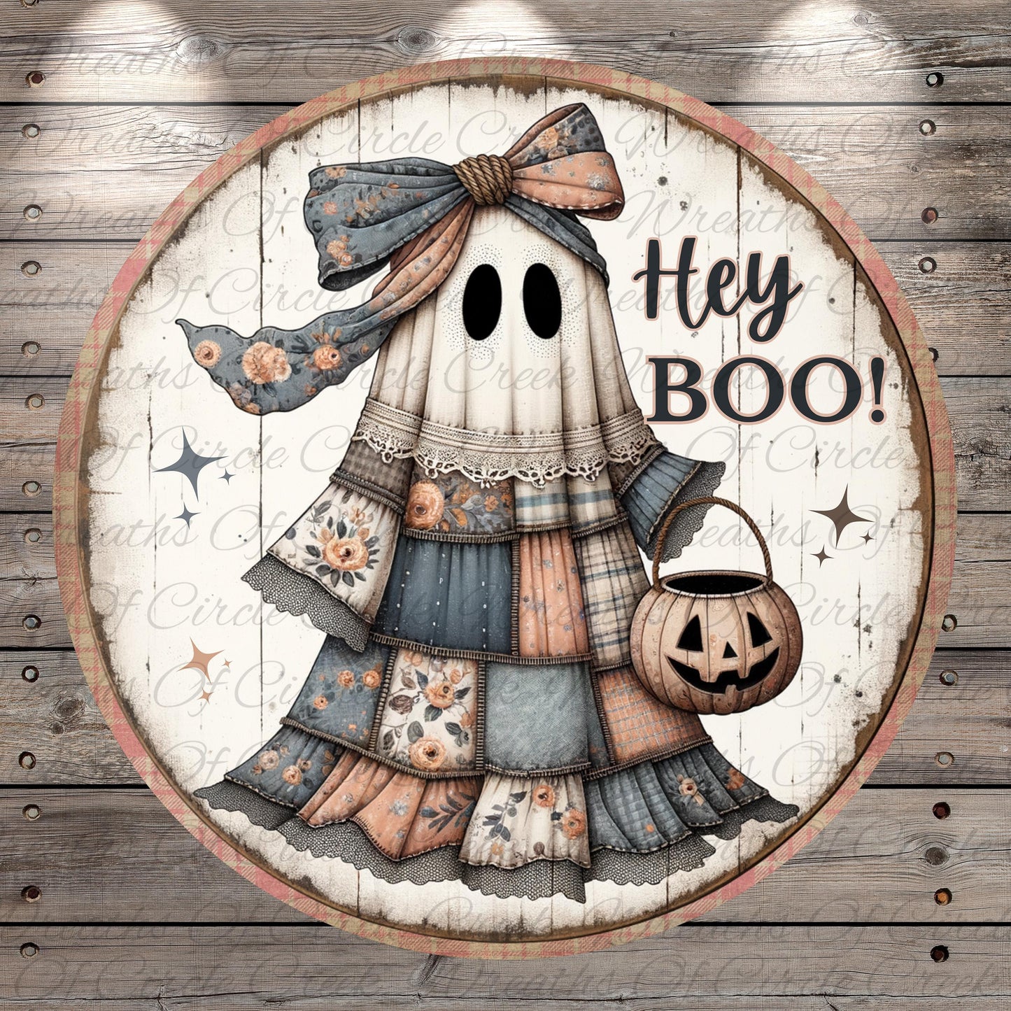 A circular Halloween-themed decoration featuring a ghost with a bow, holding a carved pumpkin and the text "Hey Boo!"