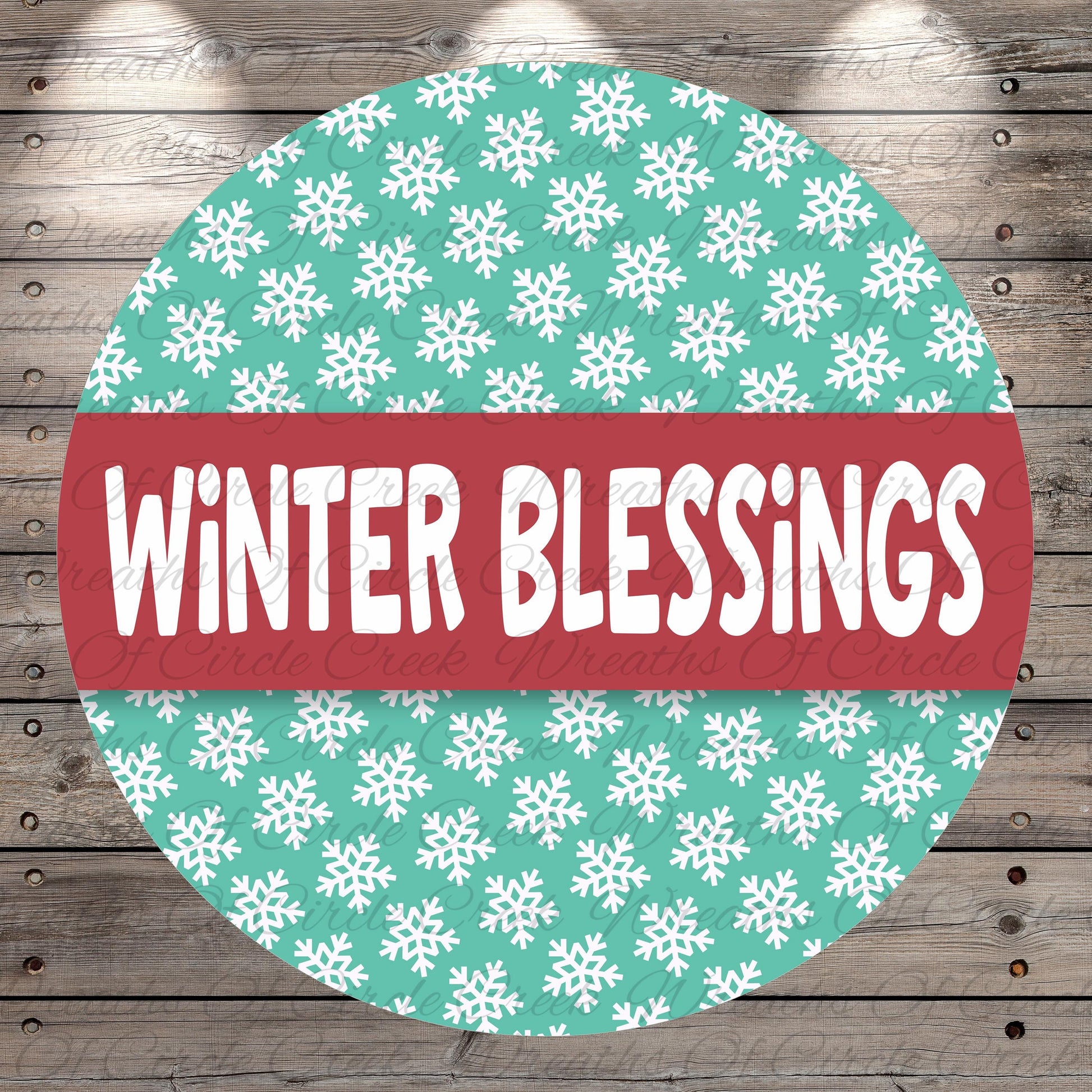 A circular sign with a pattern of white snowflakes on a teal background, and the text "Winter Blessings" written in white on a red background.