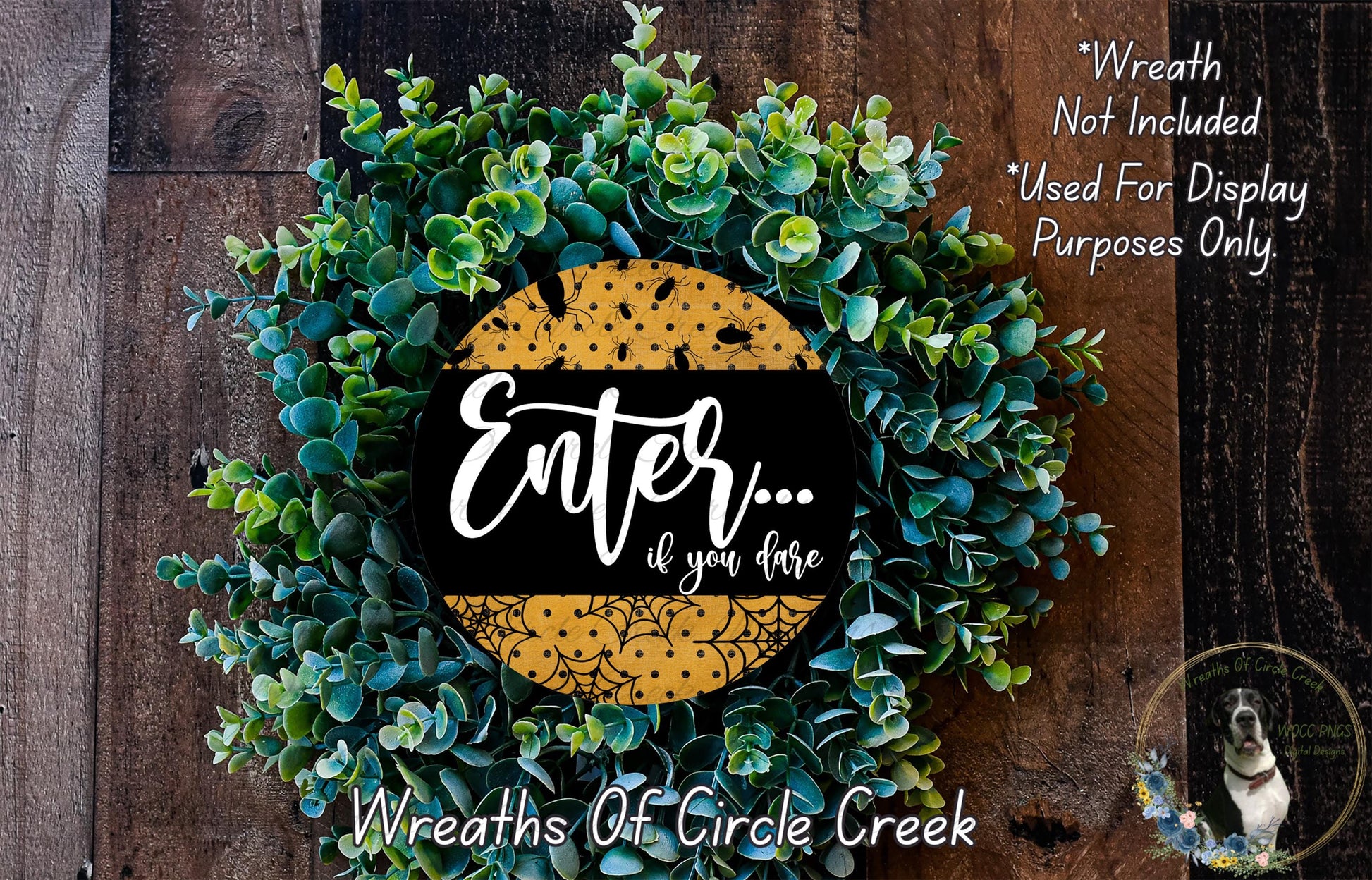 a wreath made of green and yellow plants, with a black and yellow sign that reads "Enter... if you dare" in the center. The background is a wooden wall with a dog visible in the bottom right corner.