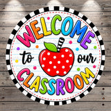 A colorful and cheerful welcome sign for a classroom, featuring a red apple with polka dots and surrounded by the text "Welcome to our classroom".