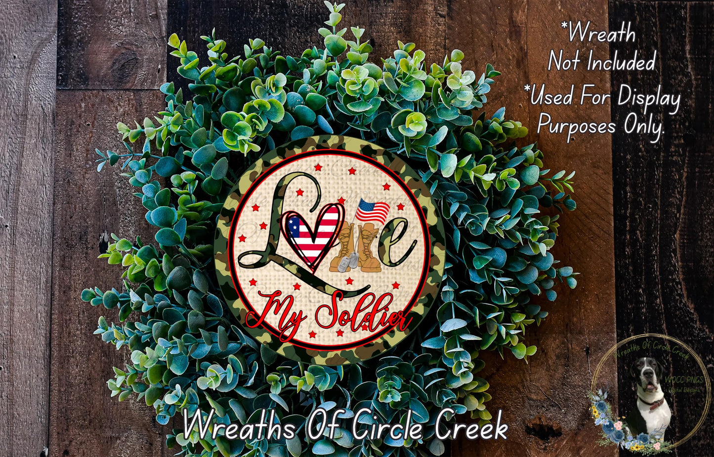 a wreath with a picture of two dogs on it