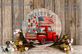 a red vintage truck with an American flag displayed on the back, surrounded by a floral arrangement and a wooden wall.