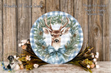a decorative wreath with a deer head at the center, surrounded by pine cones, greenery, and a blue bow. The wreath is placed on a wooden surface, and there are also some flowers and a small bird in the background.