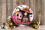A Halloween-themed wreath with a pumpkin and a young girl wearing a witch's hat, surrounded by flowers and a wooden background.