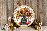 A decorative plate with a floral arrangement and a "Happy Thanksgiving" message, placed on a wooden surface.