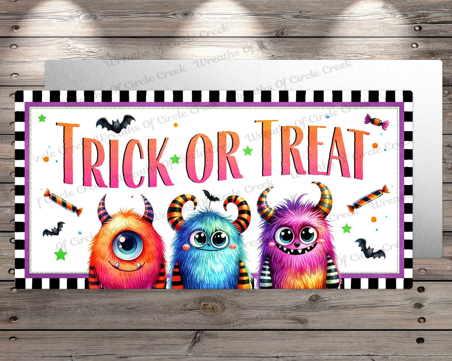 a trick or treat sign on a wooden wall