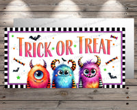 a trick or treat sign on a wooden wall