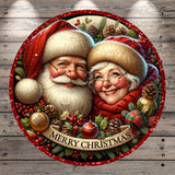Santa Claus and Grandma are depicted in a festive holiday scene, surrounded by Christmas decorations and the text &quot;MERRY CHRISTMAS&quot;.