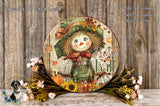 A decorative wreath featuring a scarecrow with a face, surrounded by fall-themed elements such as flowers, leaves, and a pumpkin.